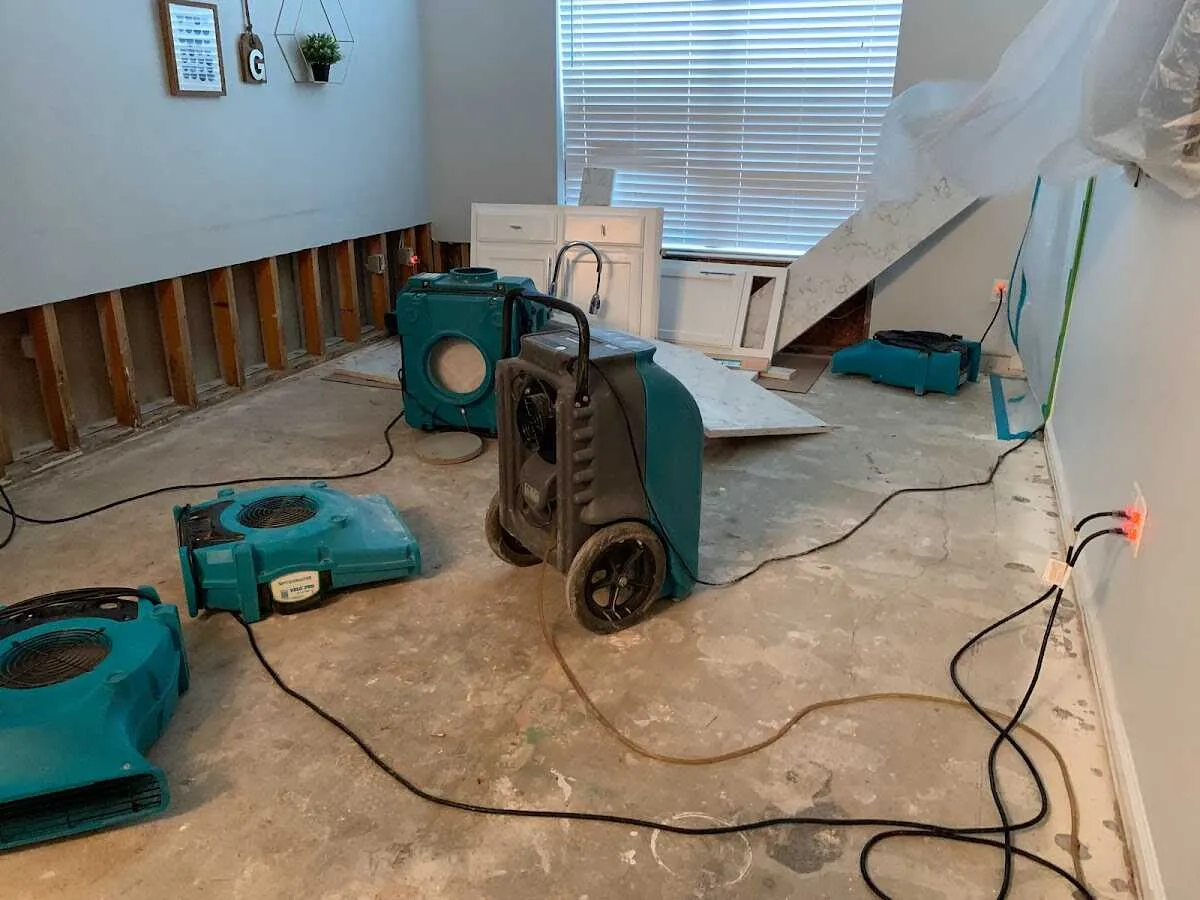 Dehumidifier in flood-cut room for Water Damage Restoration in Arlington